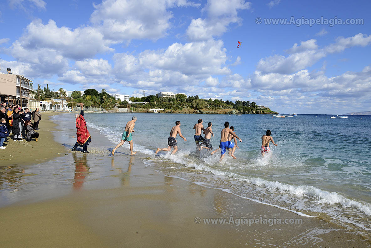 Celebrating the Greek Orthodox EPIFANIA (EPIPHANY = commemoration of the Baptism of Jesus, also called THEOFANIA) - 6th January - on the beach of Agia Pelagia Crete Greece